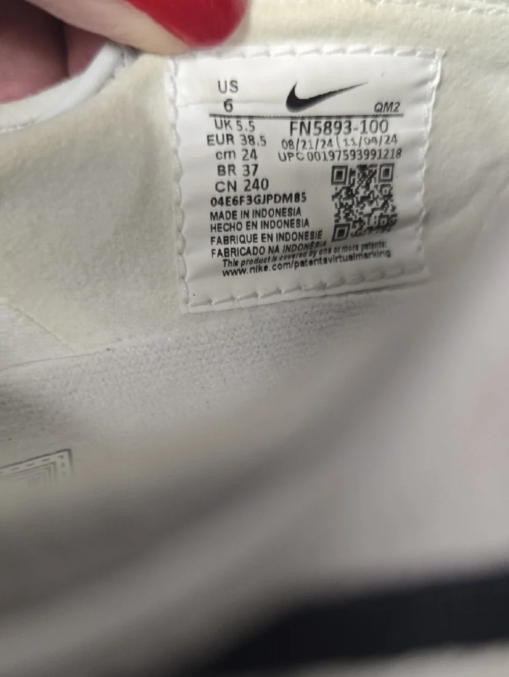 Nike Slip-On Sneakers in Off-White with Black Swoosh